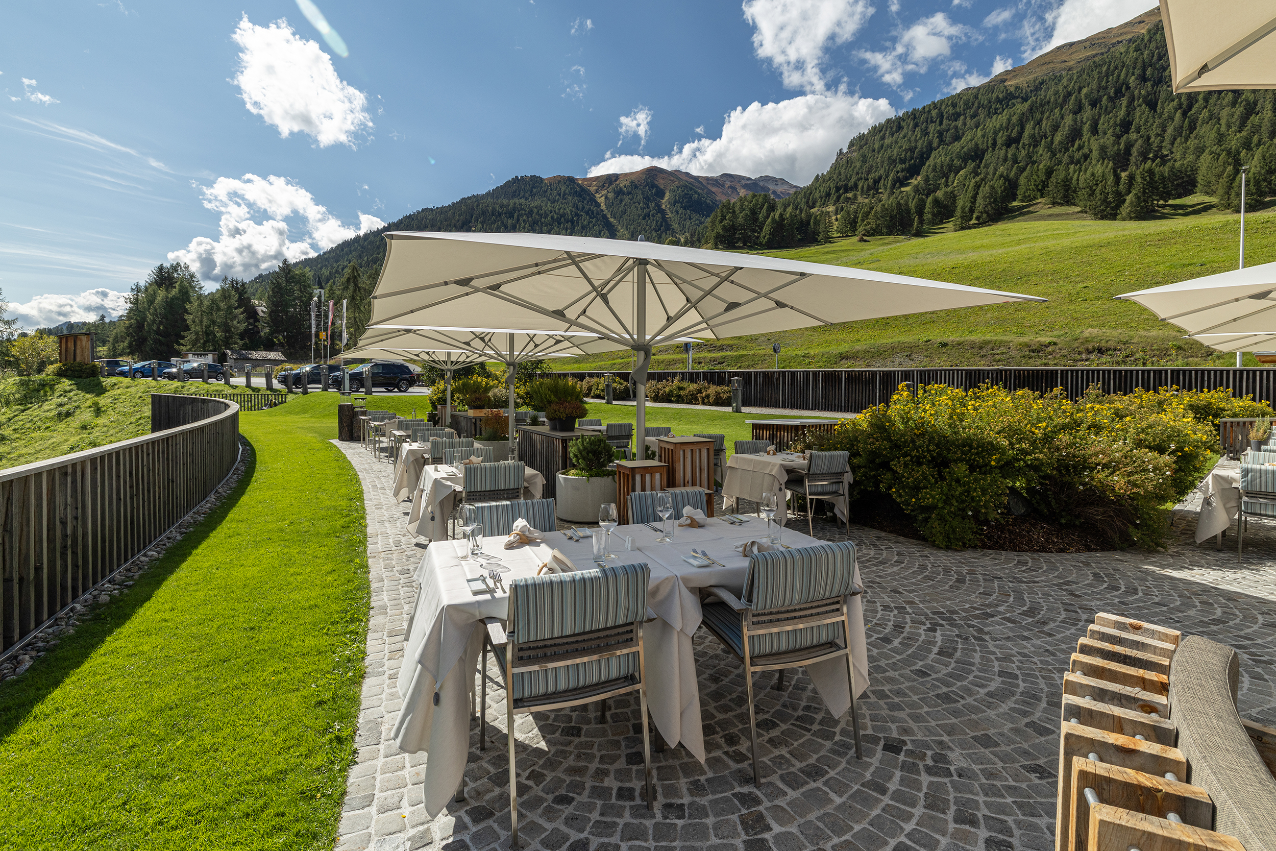 FIM commercial cantilever umbrella over a luxury pool deck